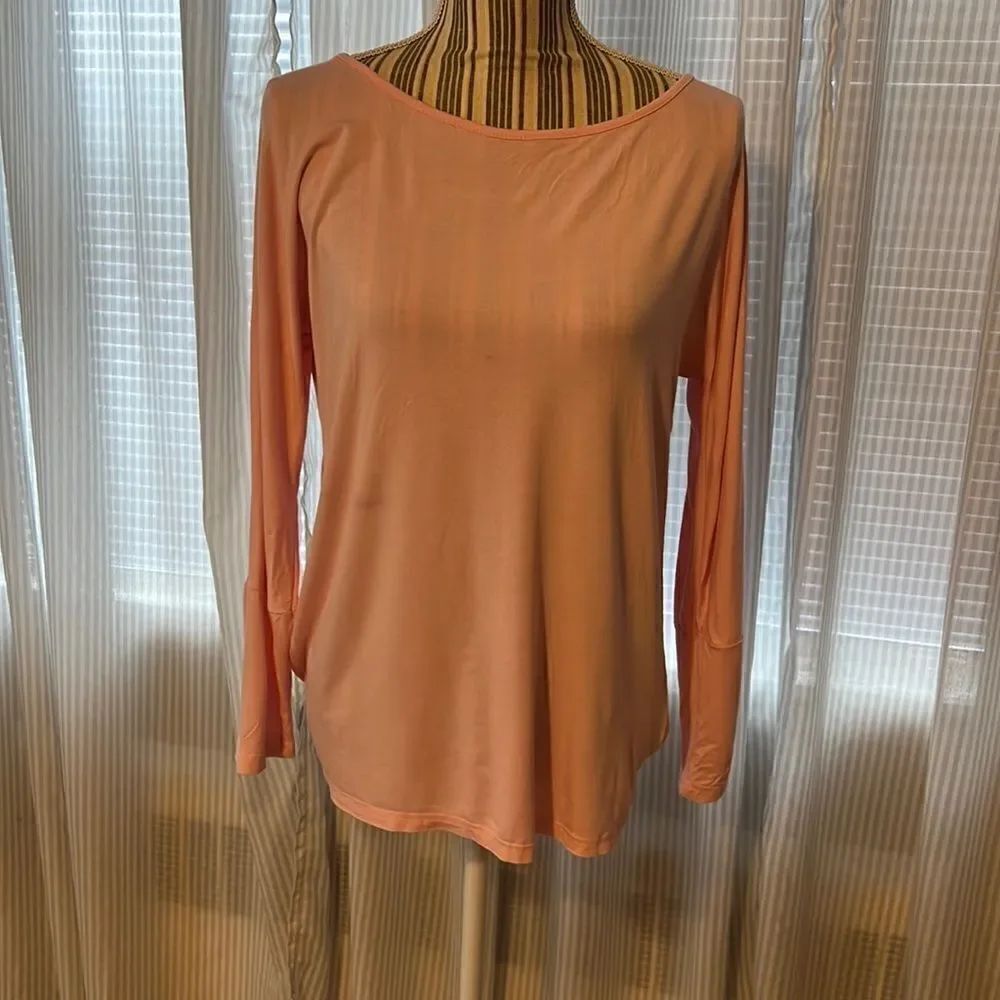 LIGHTWEIGHT pink long sleeves open back shirt. medium